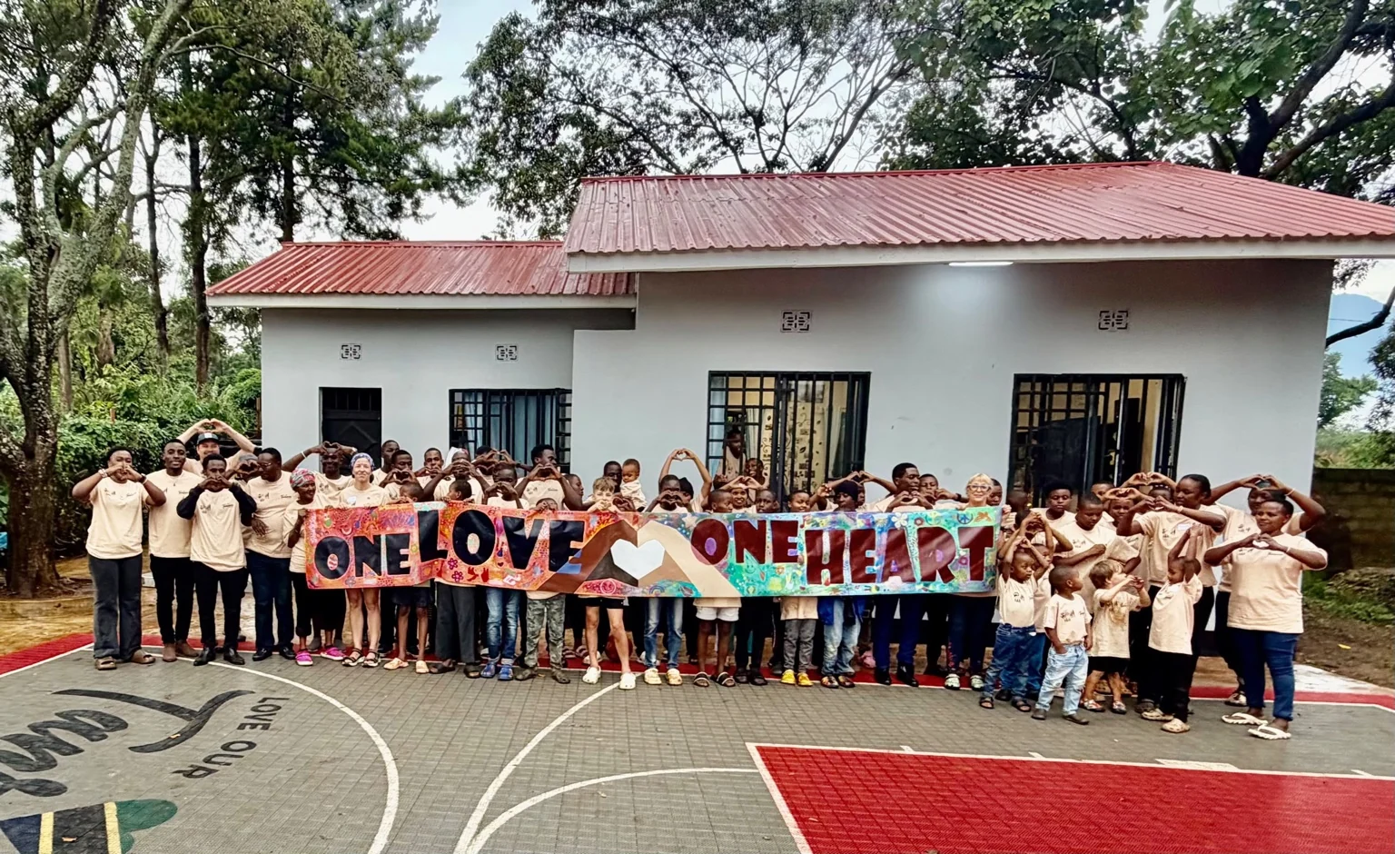 Children and supporters gathered together at a community centre in Tanzania