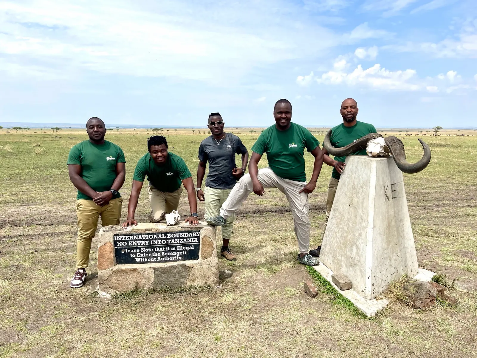 Epic Adventure guests with our safari vehicles